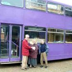 Donation being presented to Foodshare, in front of the bus that they use to provide accomodation