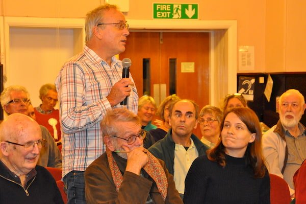 Audience member posing a question to parliamentary candidates at the Reading Quakers' general election hustings November 2019
