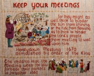 Panel from the Quaker tapestry showing children from Reading Meeting keeping the meeting going when all the adults were in prison.